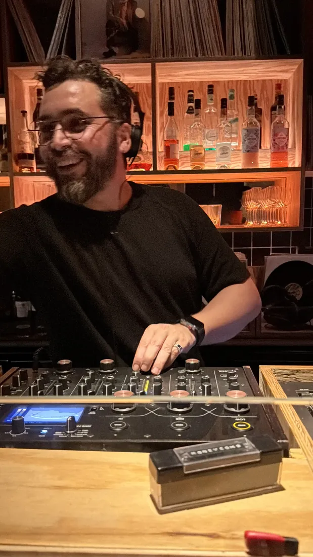 Semir Lajmi smiling behind a rotary mixer