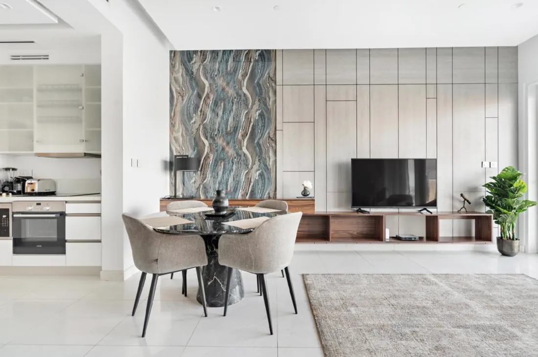 Bright apartment interior with marble dining table